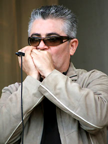 Charlie Love's harmonica player